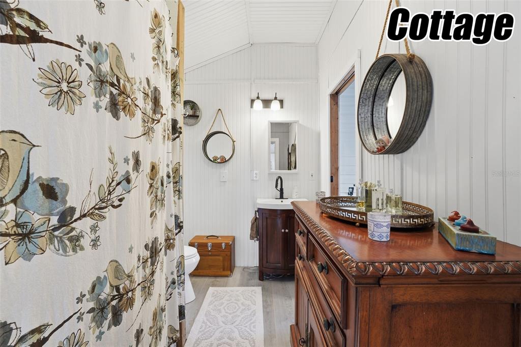 11269 Southwest Welch Avenue Arcadia, FL 34269 - Photo 31 of 41 a bathroom with a granite countertop sink and a mirror