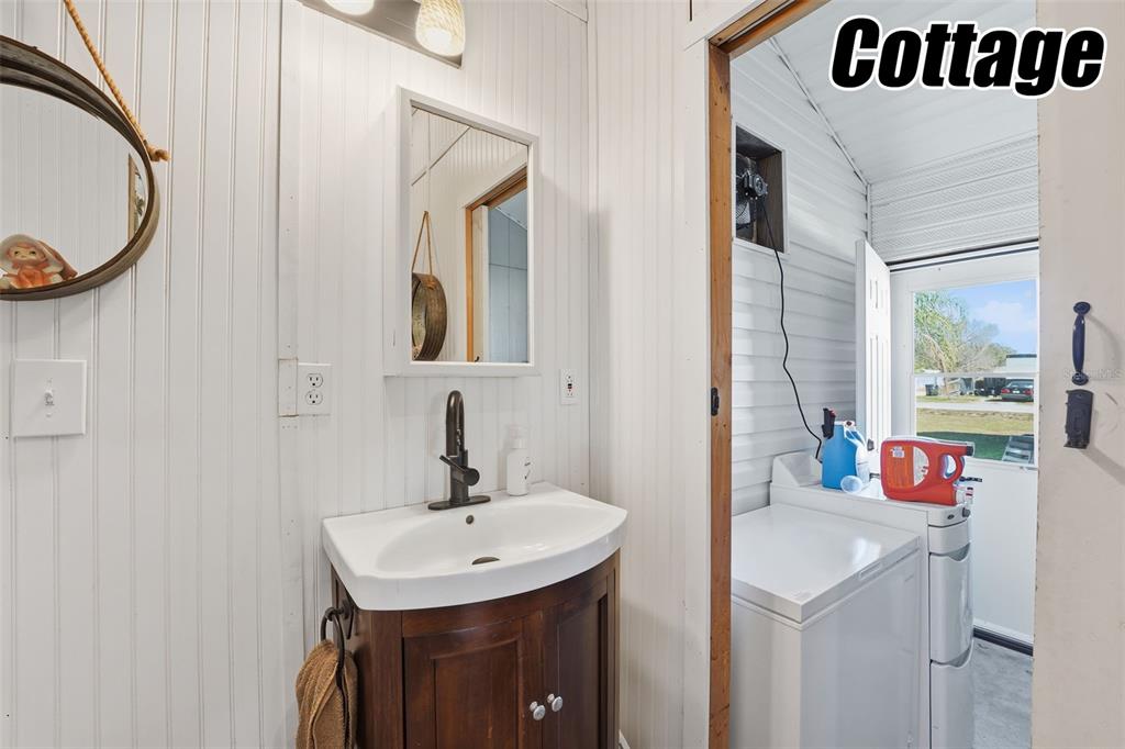 11269 Southwest Welch Avenue Arcadia, FL 34269 - Photo 32 of 41 a bathroom with a sink and a mirror