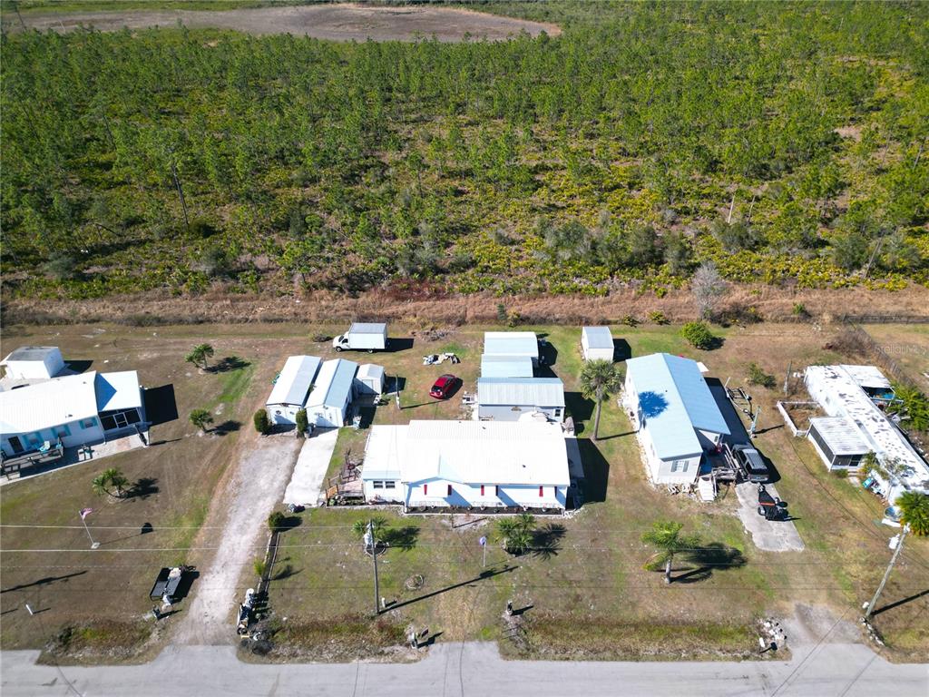11269 Southwest Welch Avenue Arcadia, FL 34269 - Photo 38 of 41 an aerial view of a houses with outdoor space