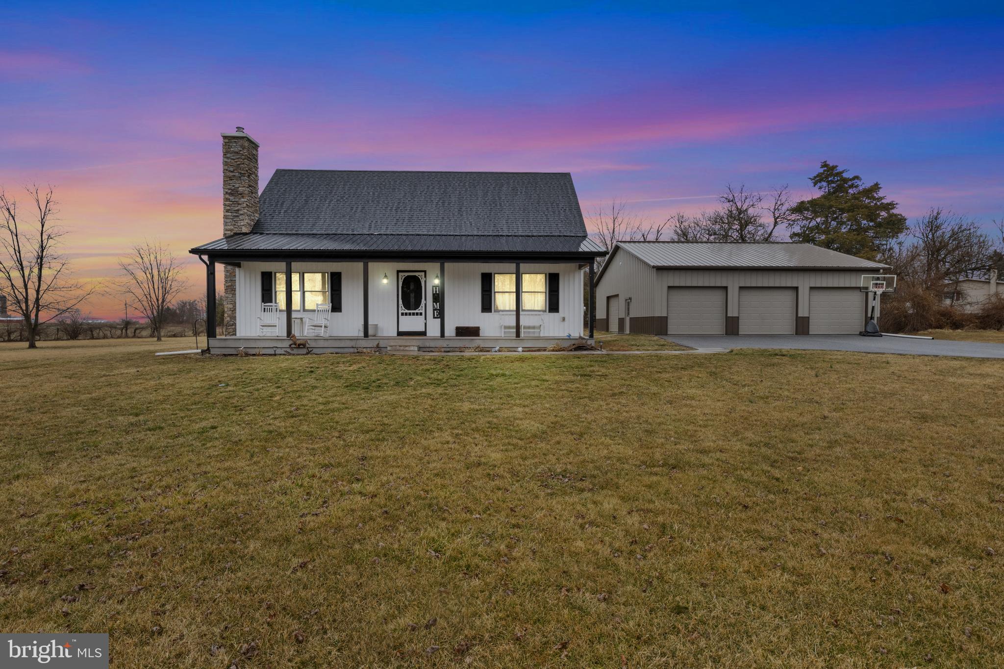 680 Bulk Plant Road Littlestown, PA 17340 - Photo 1 of 61 a house view with a garden space