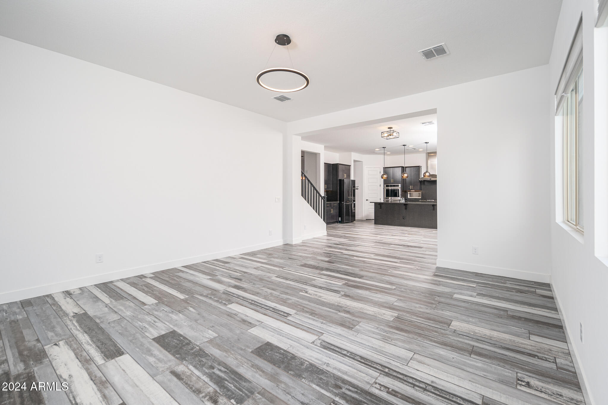 3917 East Boot Track Trail Gilbert, AZ 85296 - Photo 11 of 41 11_Family-Room_02