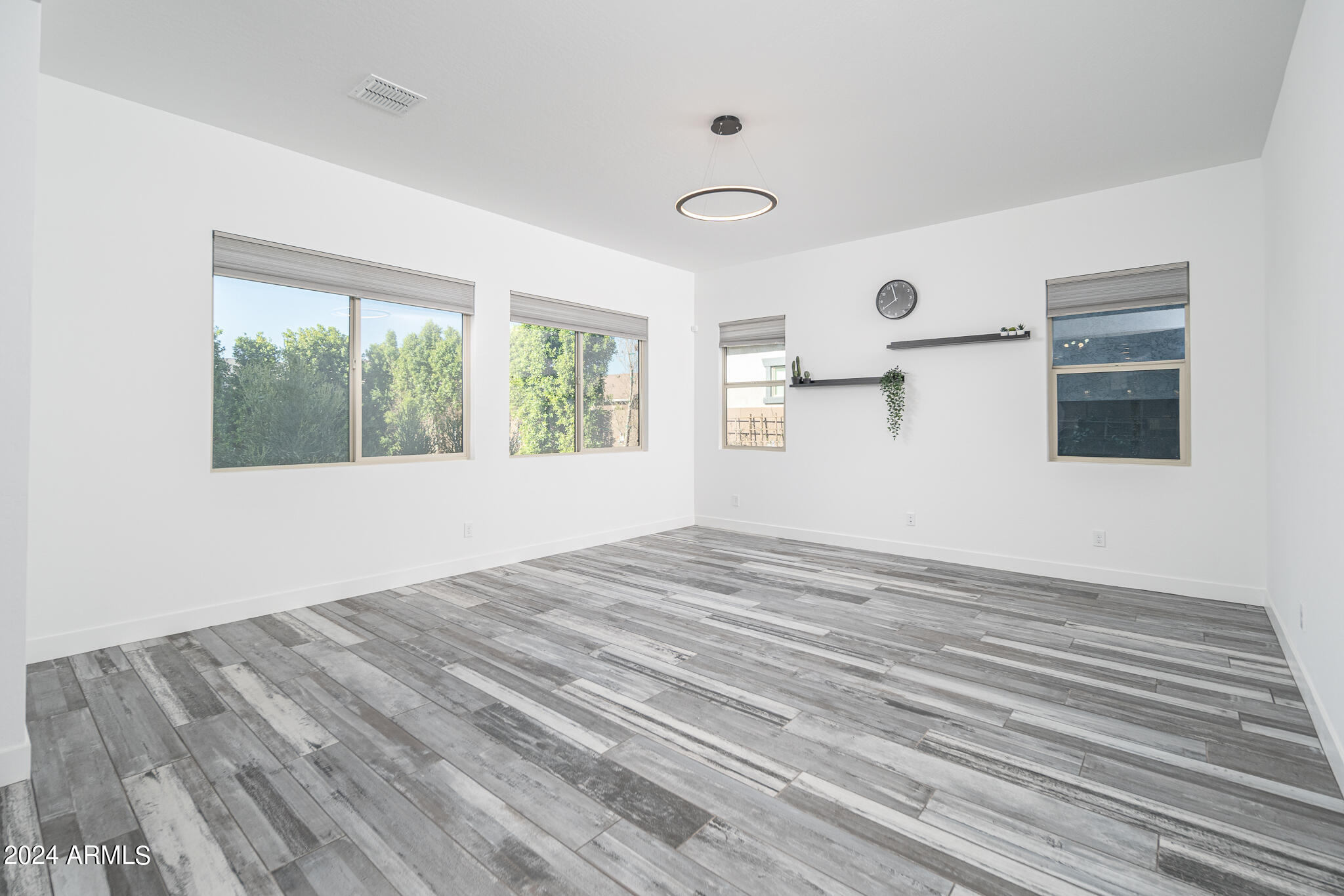 3917 East Boot Track Trail Gilbert, AZ 85296 - Photo 10 of 41 10_Family-Room_01