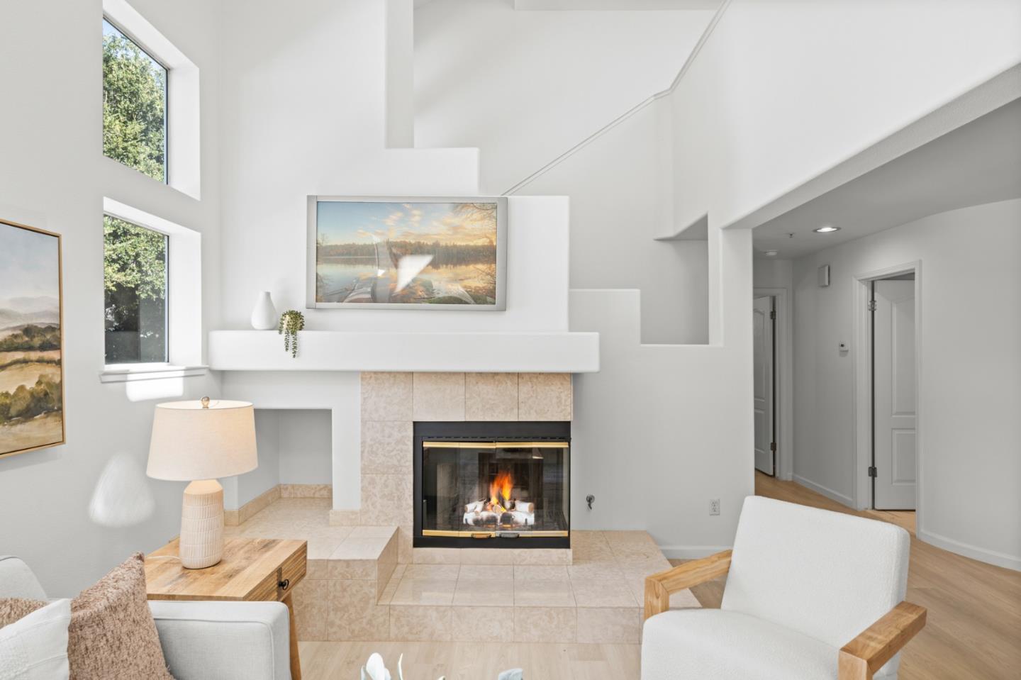 986 Alpine Terrace, Unit 4 Sunnyvale, CA 94086 - Photo 12 of 59 a living room with furniture and a fireplace