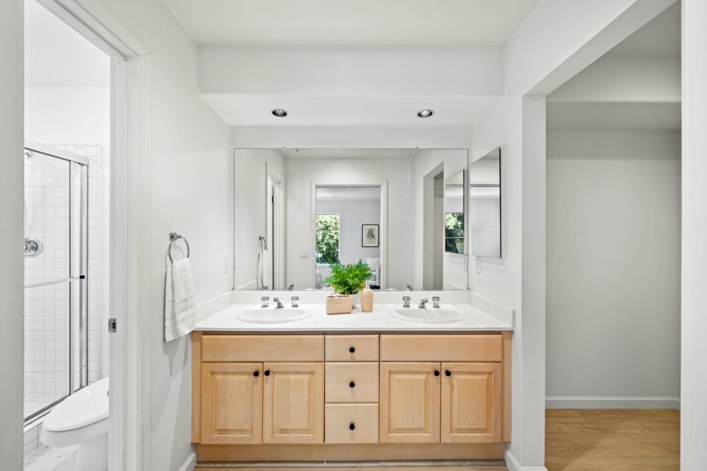 986 Alpine Terrace, Unit 4 Sunnyvale, CA 94086 - Photo 26 of 59 a bathroom with double sink and a mirror