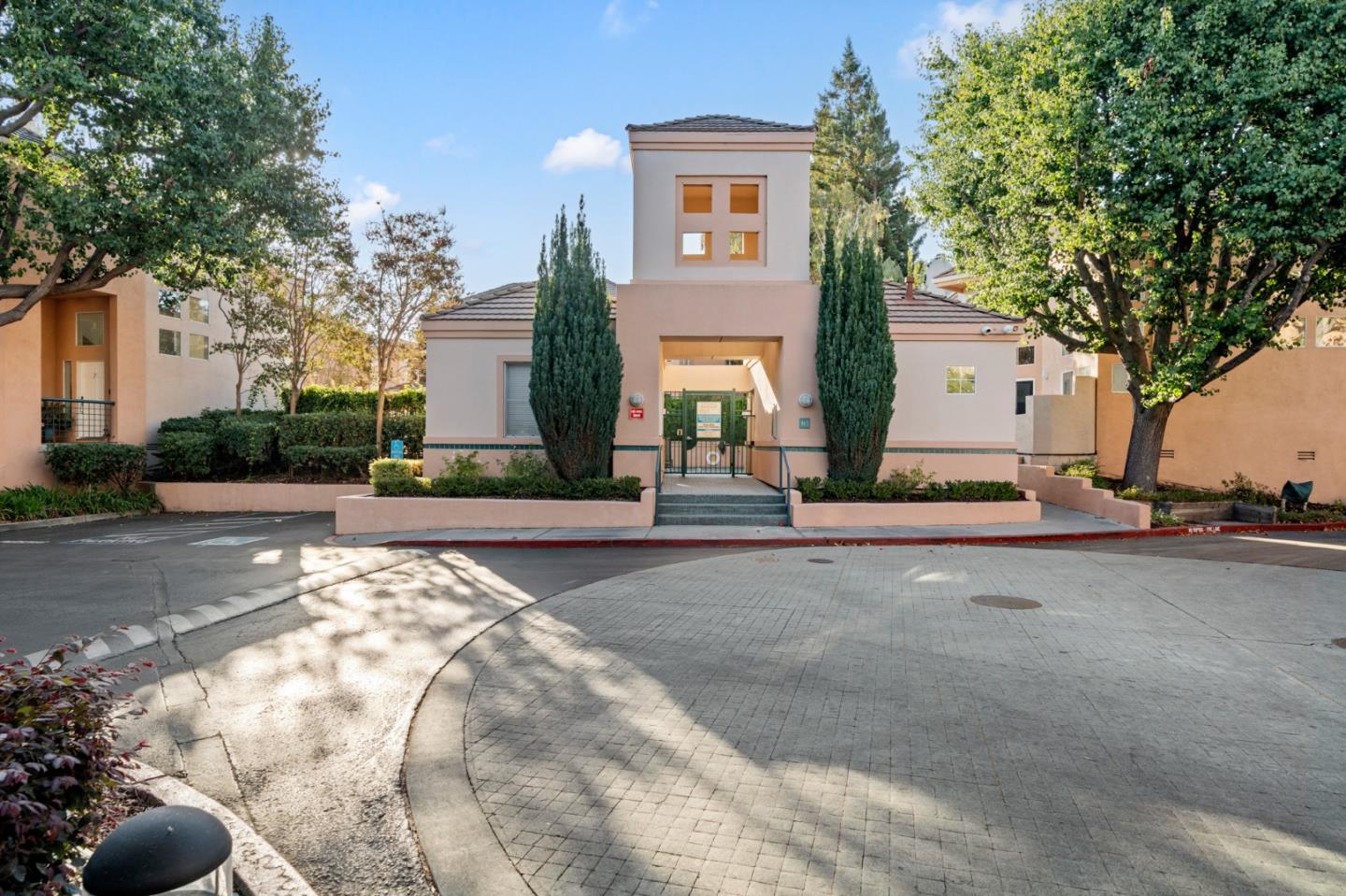 986 Alpine Terrace, Unit 4 Sunnyvale, CA 94086 - Photo 3 of 59 a view of a street with houses on both side