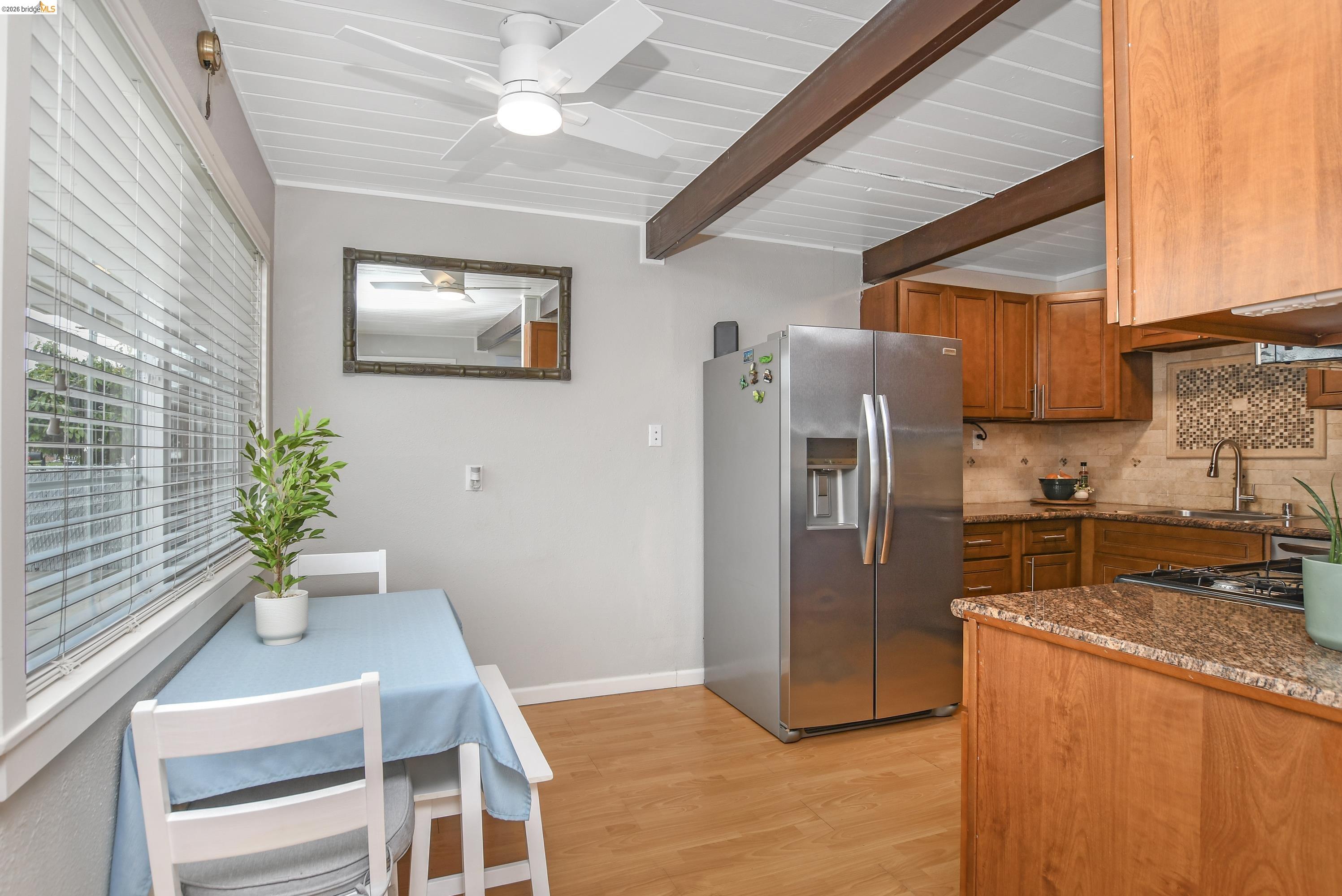 37 Beach Drive Bay Point, CA 94565 - Photo 12 of 33 a kitchen with stainless steel appliances granite countertop a refrigerator a sink a stove and dishwasher