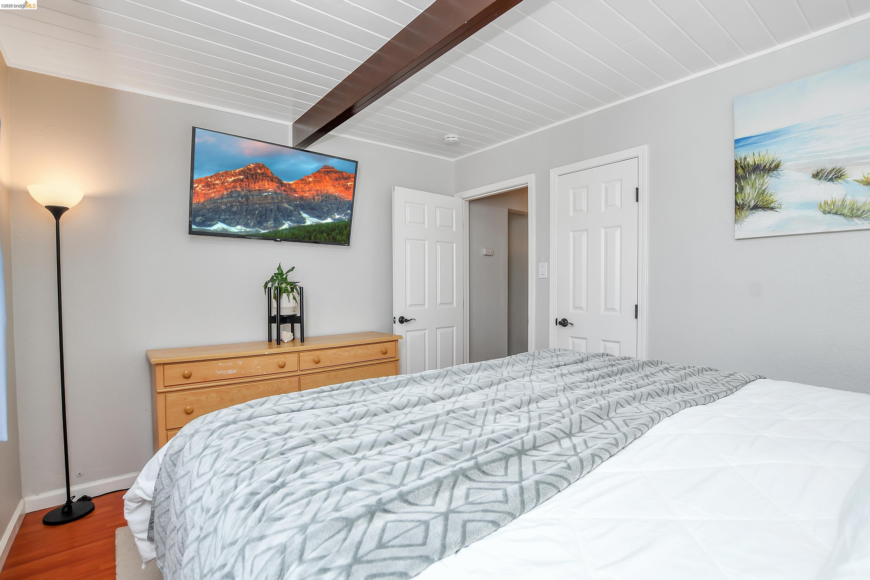 37 Beach Drive Bay Point, CA 94565 - Photo 15 of 33 a bedroom with a bed and a flat screen tv