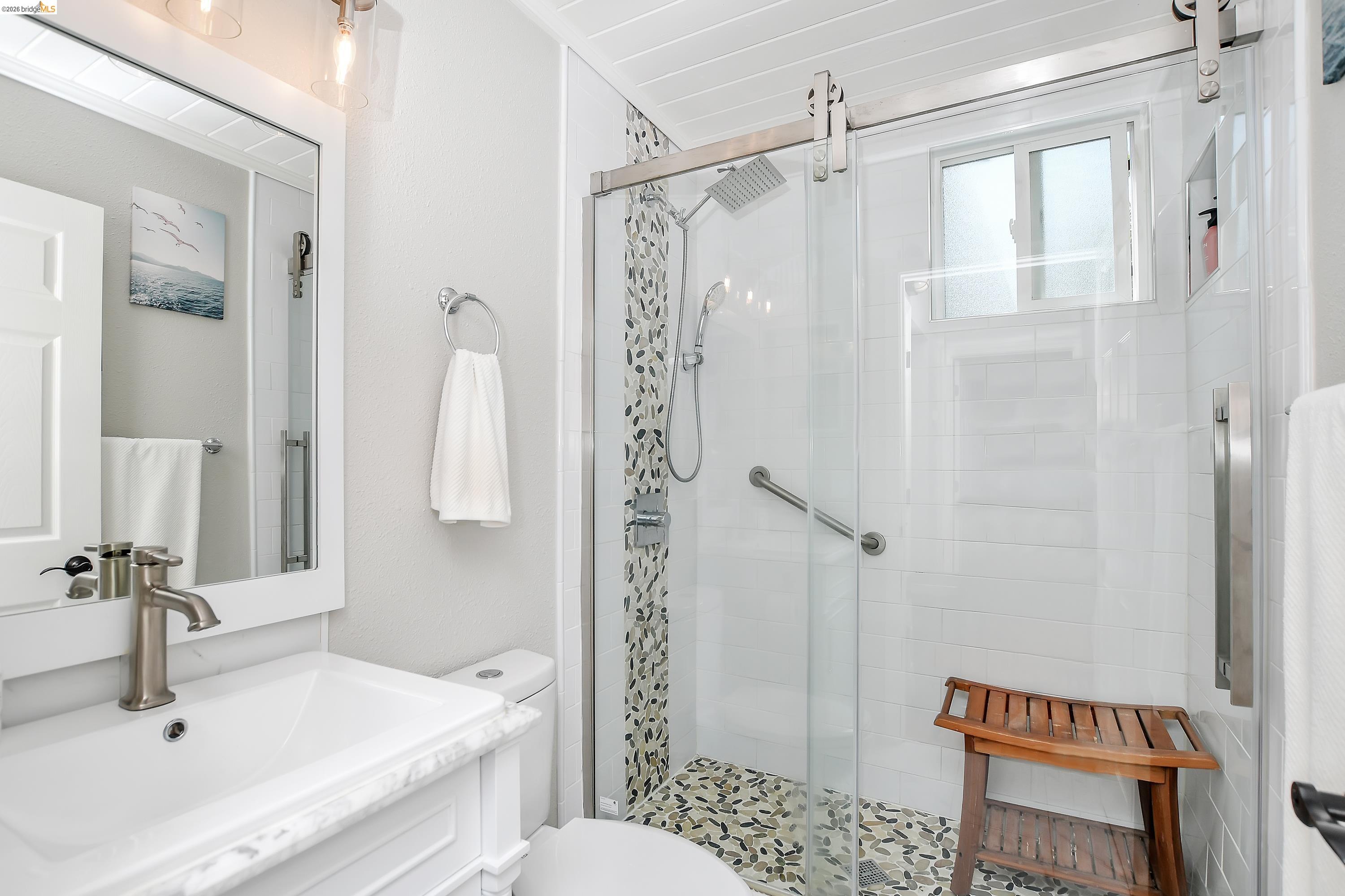37 Beach Drive Bay Point, CA 94565 - Photo 16 of 33 a bathroom with a sink a toilet and shower