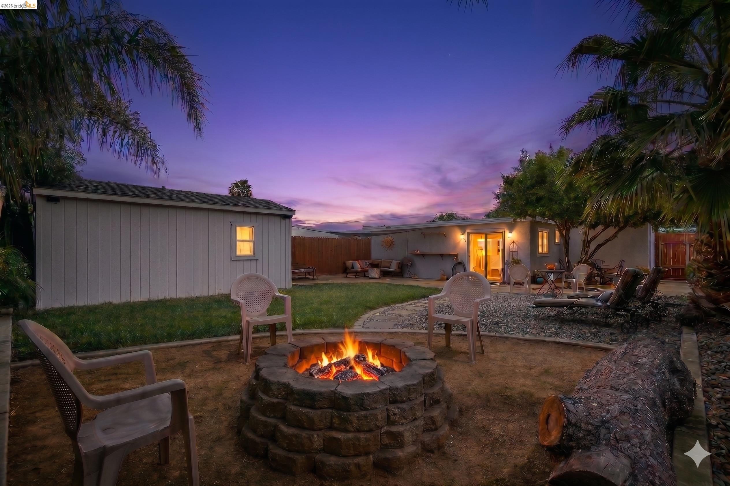 37 Beach Drive Bay Point, CA 94565 - Photo 26 of 33 a view of a backyard with furniture and a fire pit