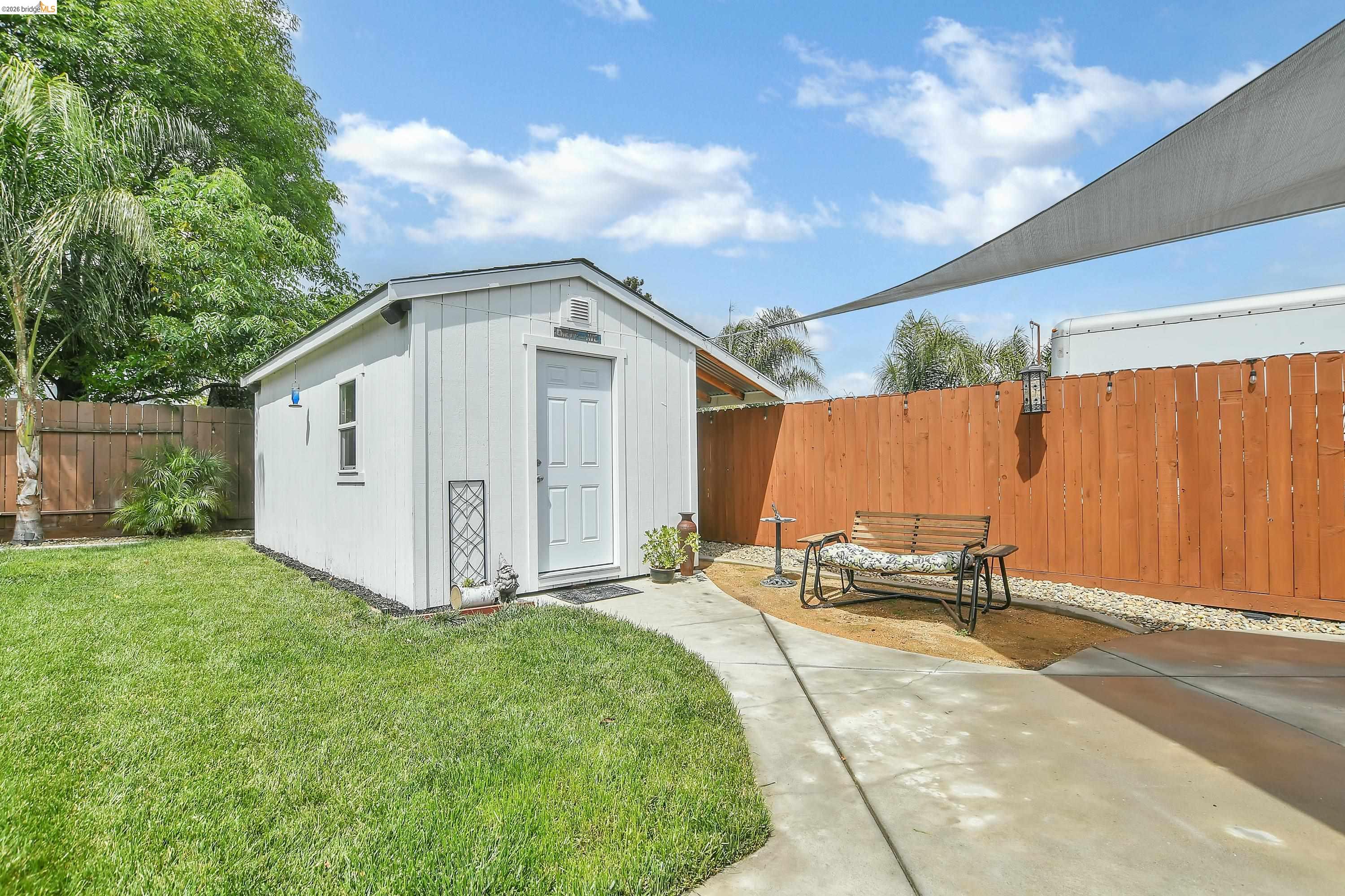 37 Beach Drive Bay Point, CA 94565 - Photo 29 of 33 a backyard of a house with table and chairs