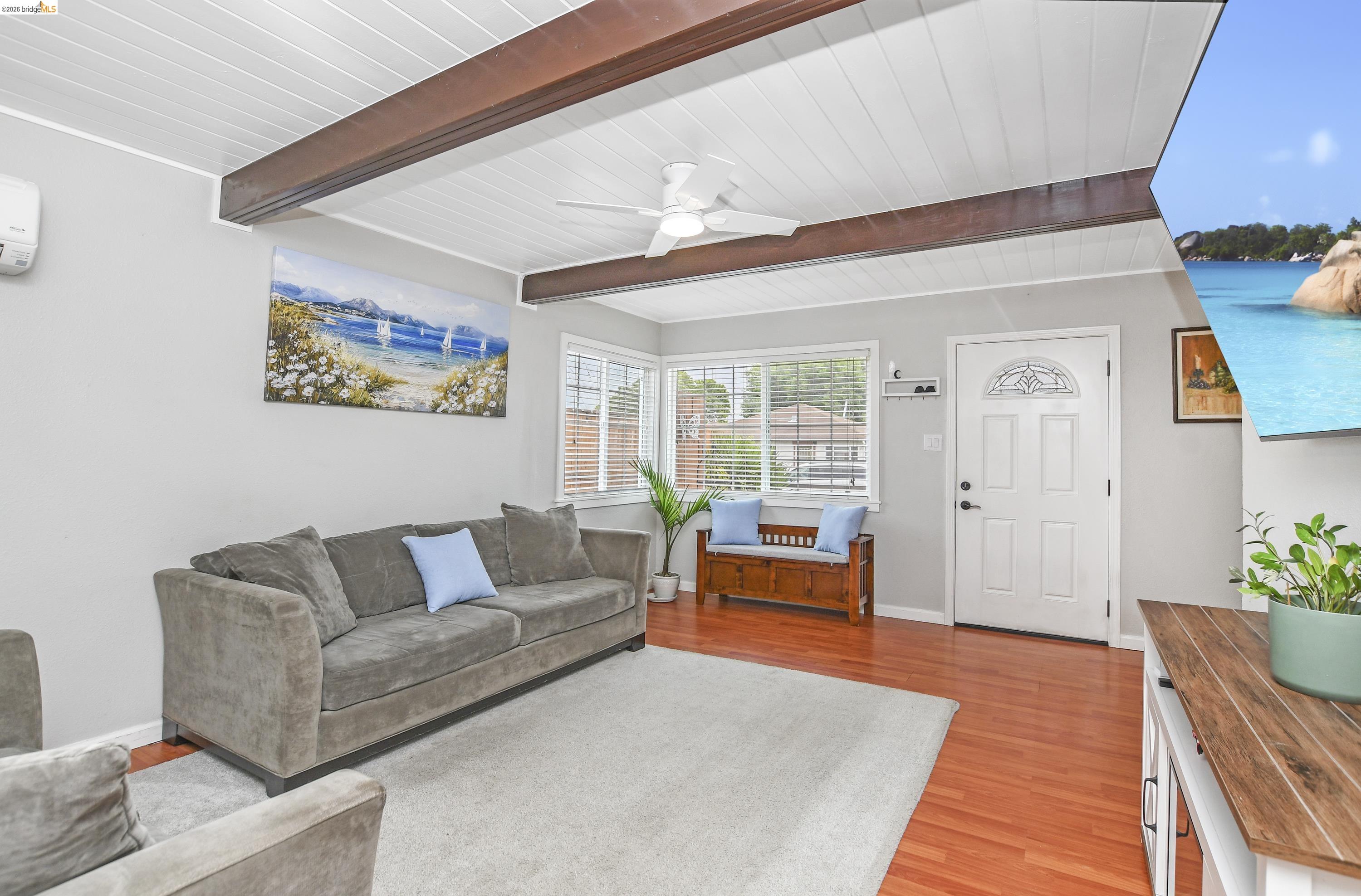 37 Beach Drive Bay Point, CA 94565 - Photo 8 of 33 a living room with furniture and a potted plant