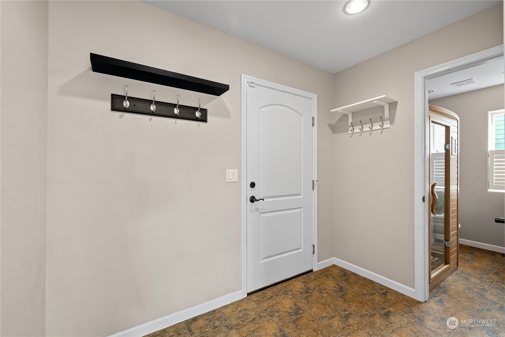 10121 Meadowside Lane Southwest Rochester, WA 98579 - Photo 14 of 35 a view of a hallway with closet