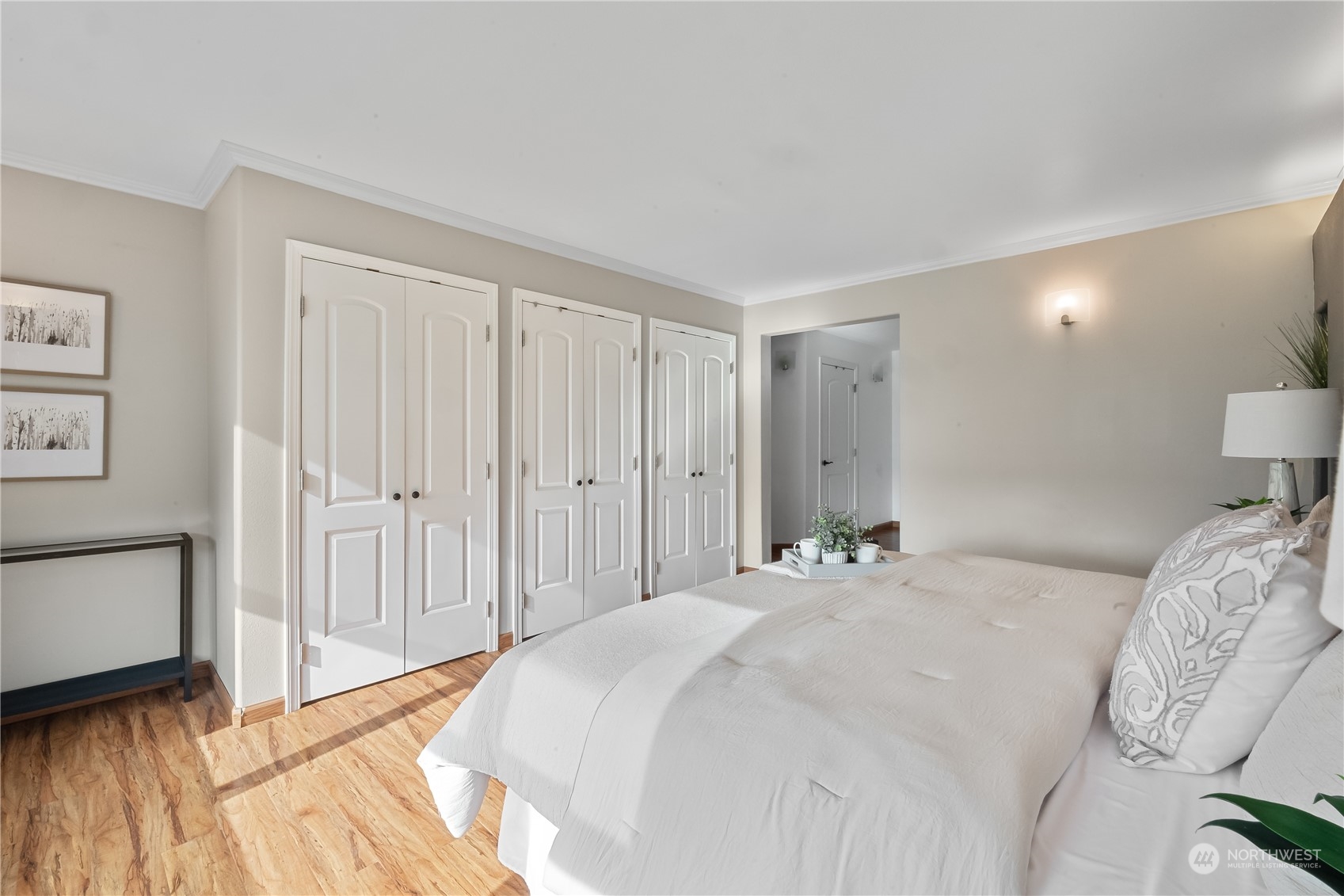 10121 Meadowside Lane Southwest Rochester, WA 98579 - Photo 20 of 35 a bedroom with a bed and a painting on the wall