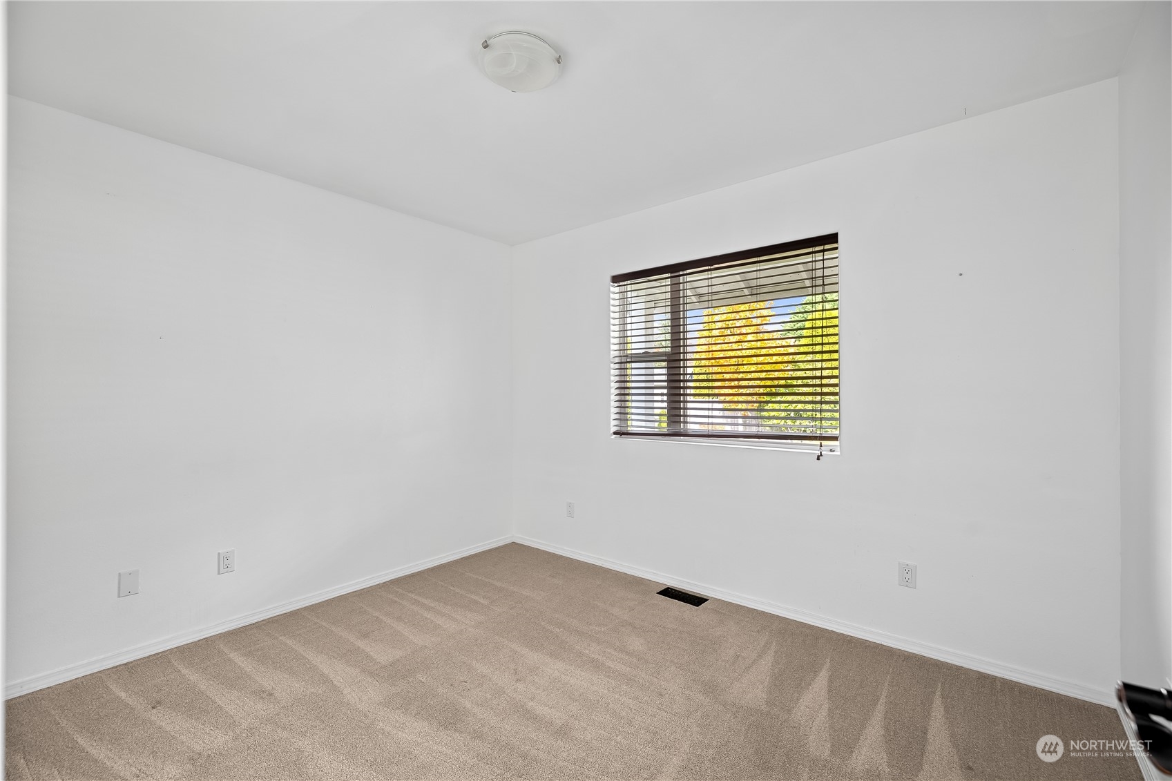 10121 Meadowside Lane Southwest Rochester, WA 98579 - Photo 23 of 35 an empty room with a window
