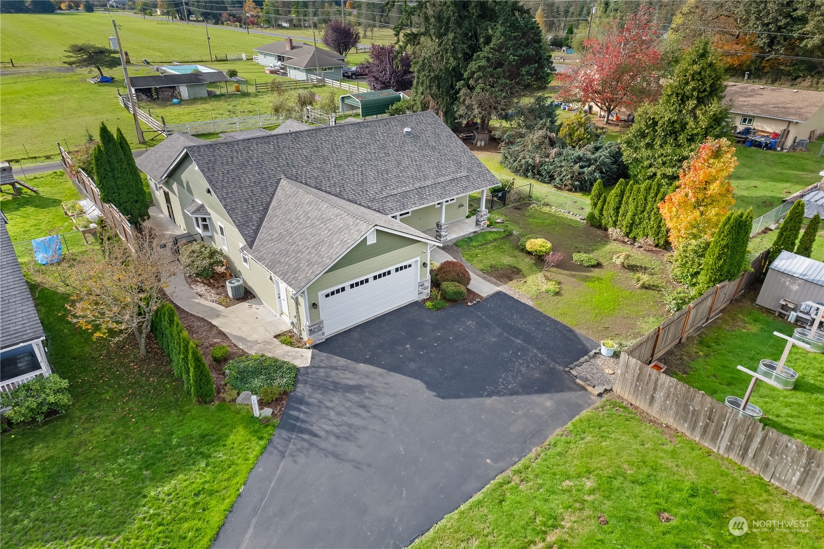 10121 Meadowside Lane Southwest Rochester, WA 98579 - Photo 27 of 35 an aerial view of a house with a yard