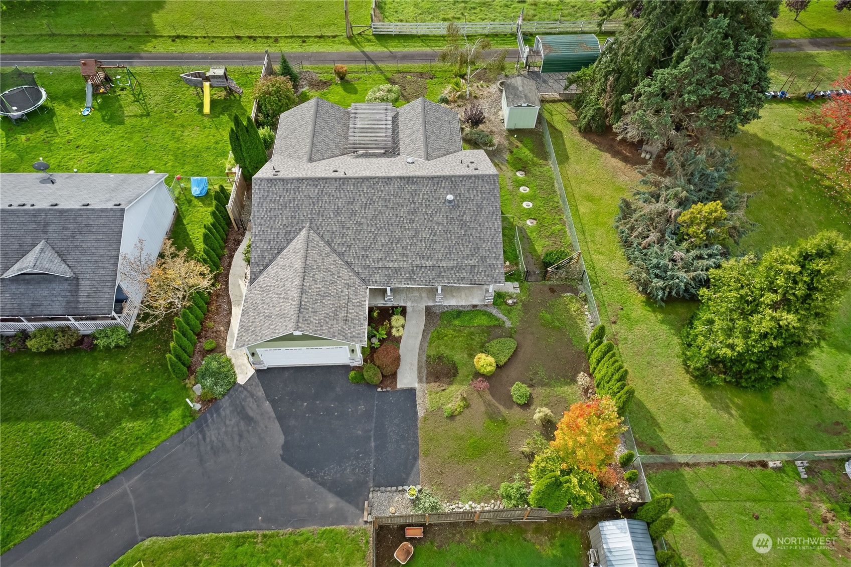 10121 Meadowside Lane Southwest Rochester, WA 98579 - Photo 3 of 35 an aerial view of a house with a garden