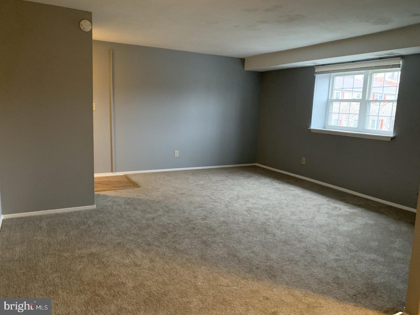 11908 Tarragon Road, Unit I Reisterstown, MD 21136 - Photo 4 of 9 Spacious, light-filled living area.