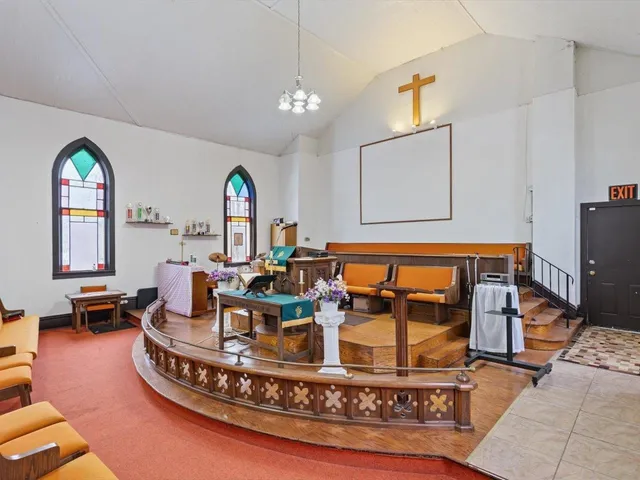 a view of a dining room with furniture