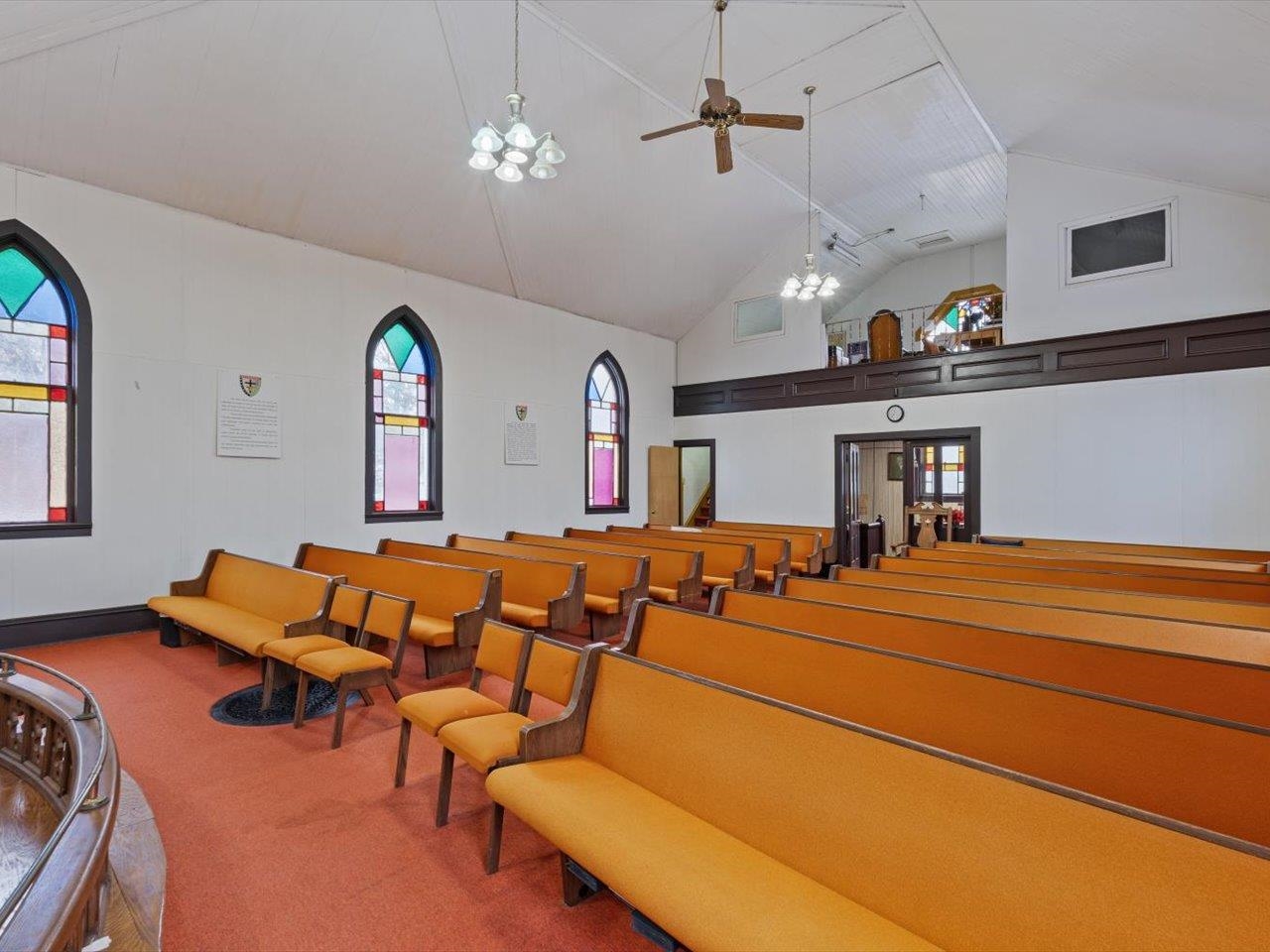 1222 7th Avenue Moline, IL 61265 - Photo 19 of 24 a projector room with furniture and a chandelier