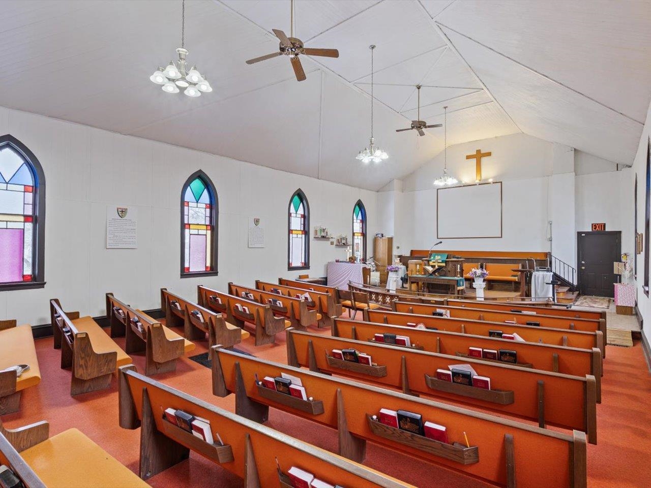 1222 7th Avenue Moline, IL 61265 - Photo 10 of 24 a room with gym equipment and wooden floor