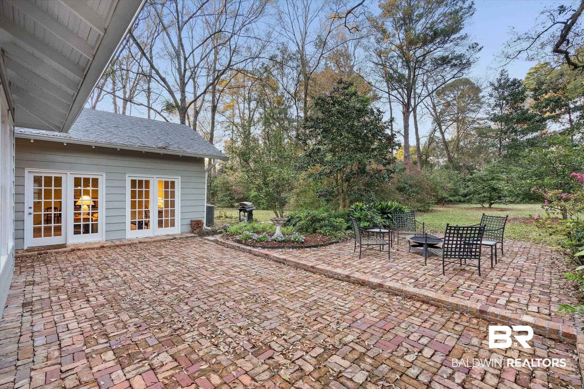 2 Westgate Road Mobile, AL 36608 - Photo 41 of 63 View of patio with a fire pit, area for grilling, and french doors