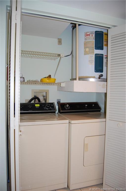 1881 Southwest Palm City Road, Unit H201 Stuart, FL 34994 - Photo 23 of 33 a close view of stove and microwave