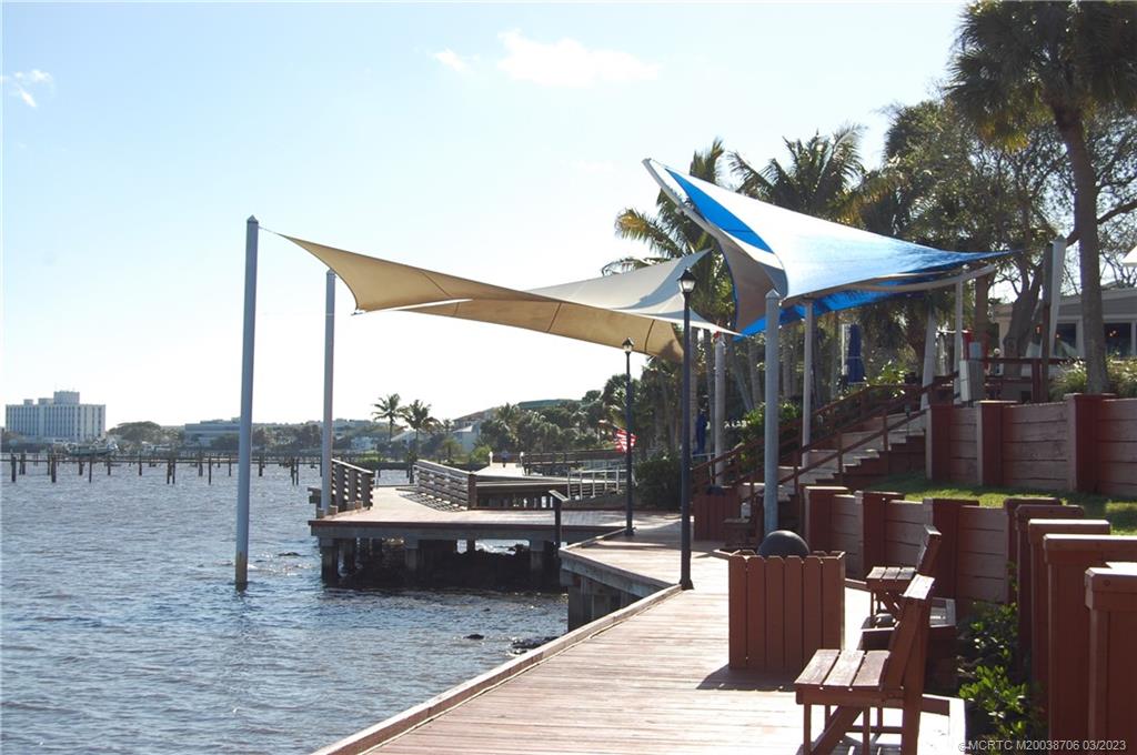 1881 Southwest Palm City Road, Unit H201 Stuart, FL 34994 - Photo 32 of 33 a terrace view with sitting space