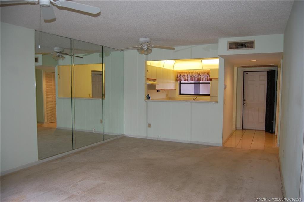 1881 Southwest Palm City Road, Unit H201 Stuart, FL 34994 - Photo 10 of 33 a view of an empty room