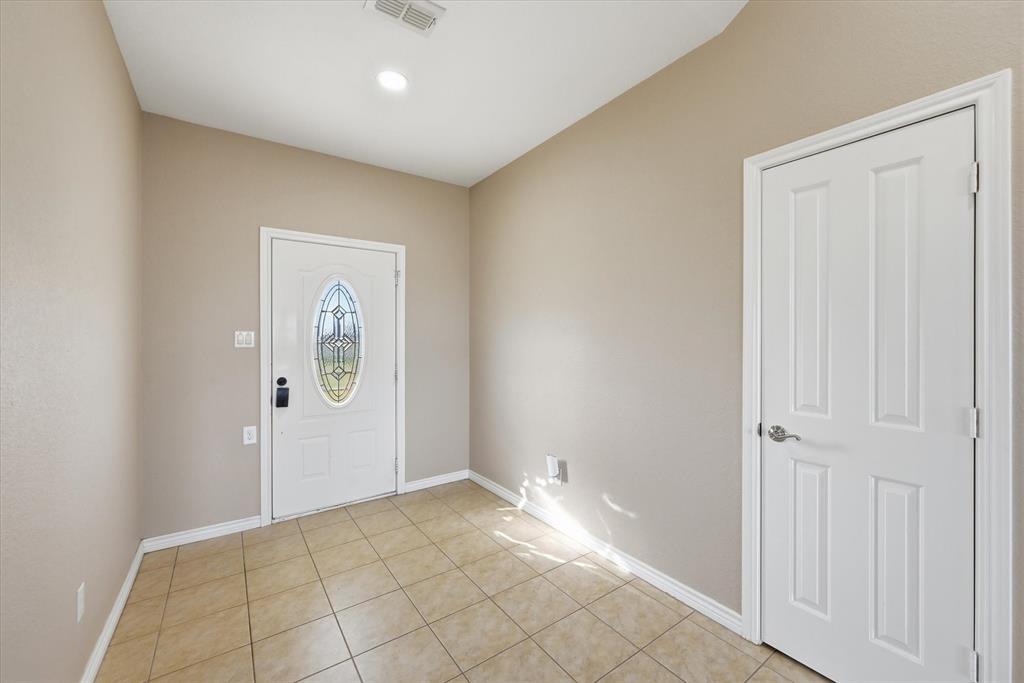 1616 Nash-Howard Road Waxahachie, TX 75165 - Photo 7 of 36 a view of an empty room and closet area