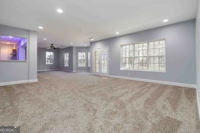 an empty room with windows