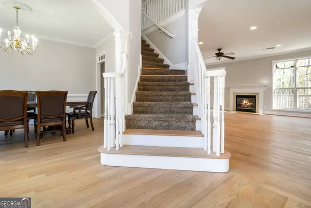 a view of a livingroom with furniture and wooden floor