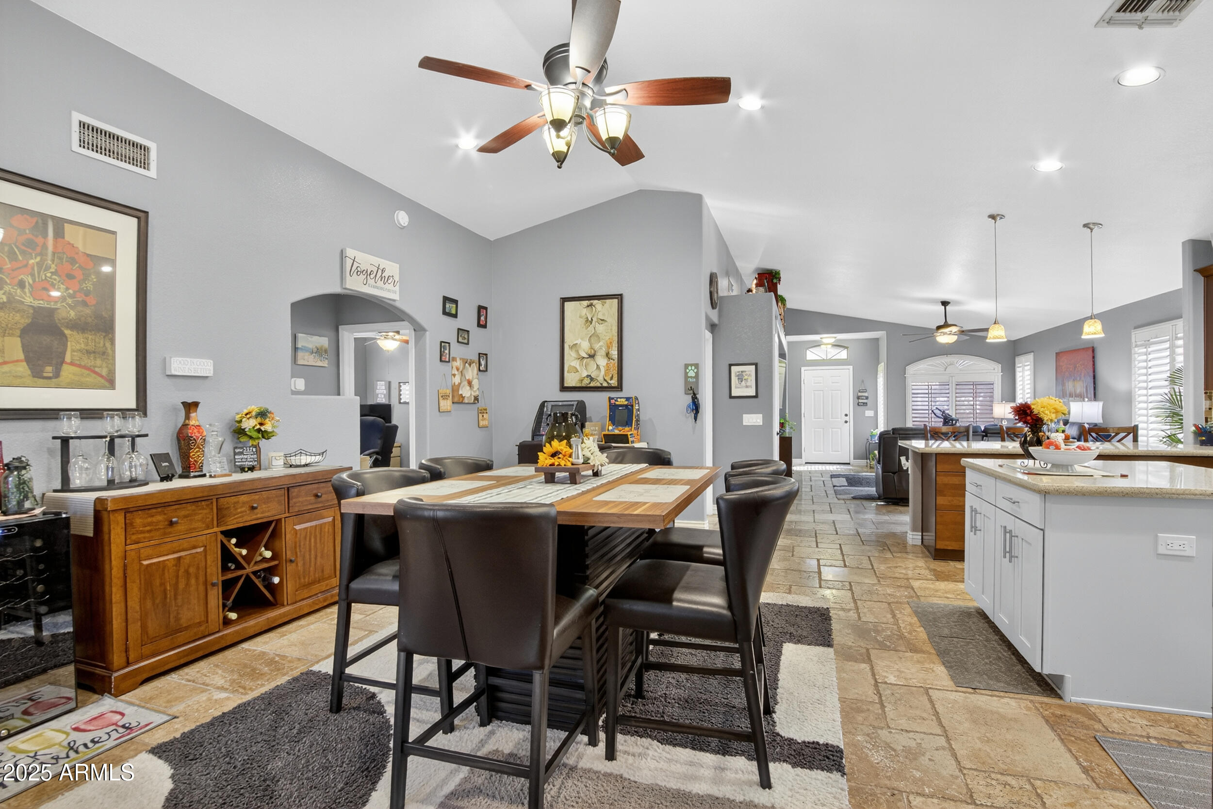 3930 East Agave Road Phoenix, AZ 85044 - Photo 20 of 44 a view of a dining room with furniture