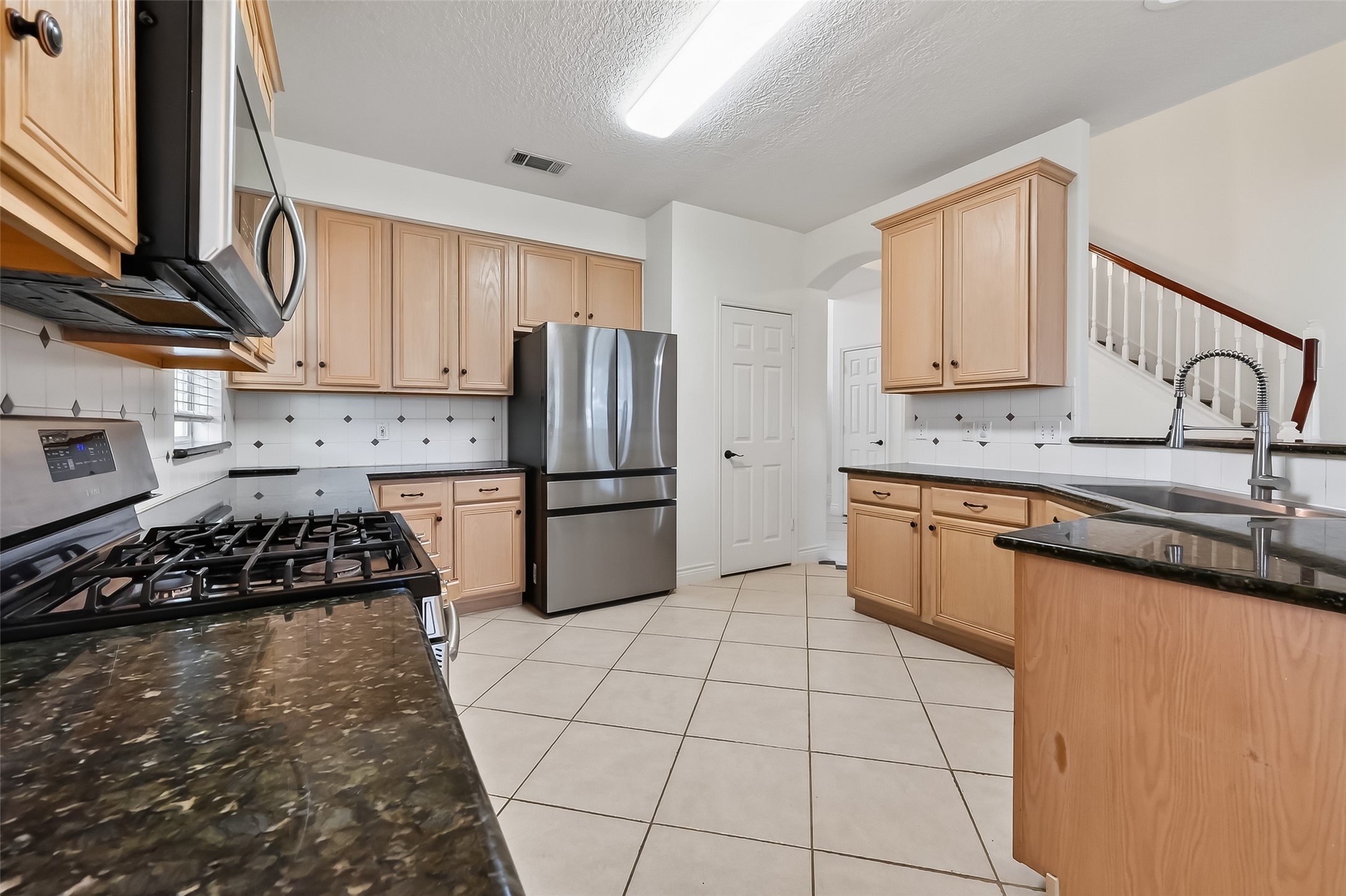 19715 Azalea Brook Way Houston, TX 77084 - Photo 15 of 48 Open to the main living room and breakfast area