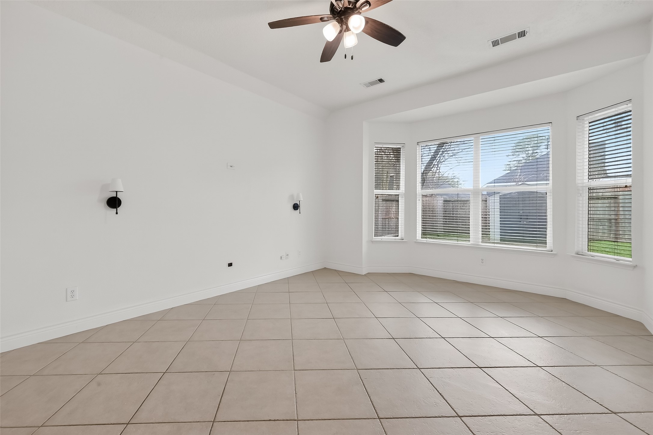 19715 Azalea Brook Way Houston, TX 77084 - Photo 26 of 48 a view of an empty room with a window