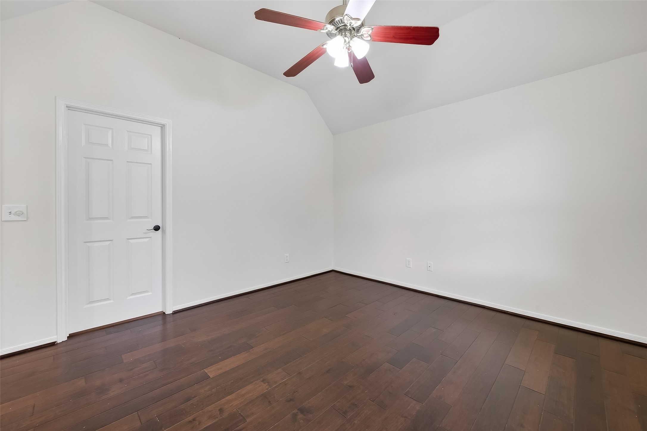 19715 Azalea Brook Way Houston, TX 77084 - Photo 36 of 48 an empty room with wooden floor closet and fan