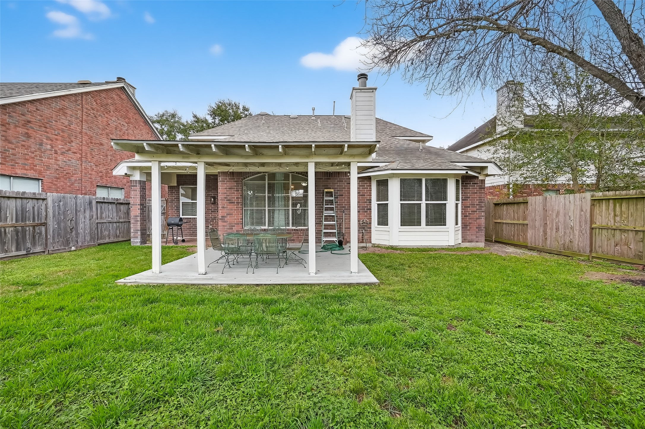 19715 Azalea Brook Way Houston, TX 77084 - Photo 47 of 48 a view of a house with a yard and plants