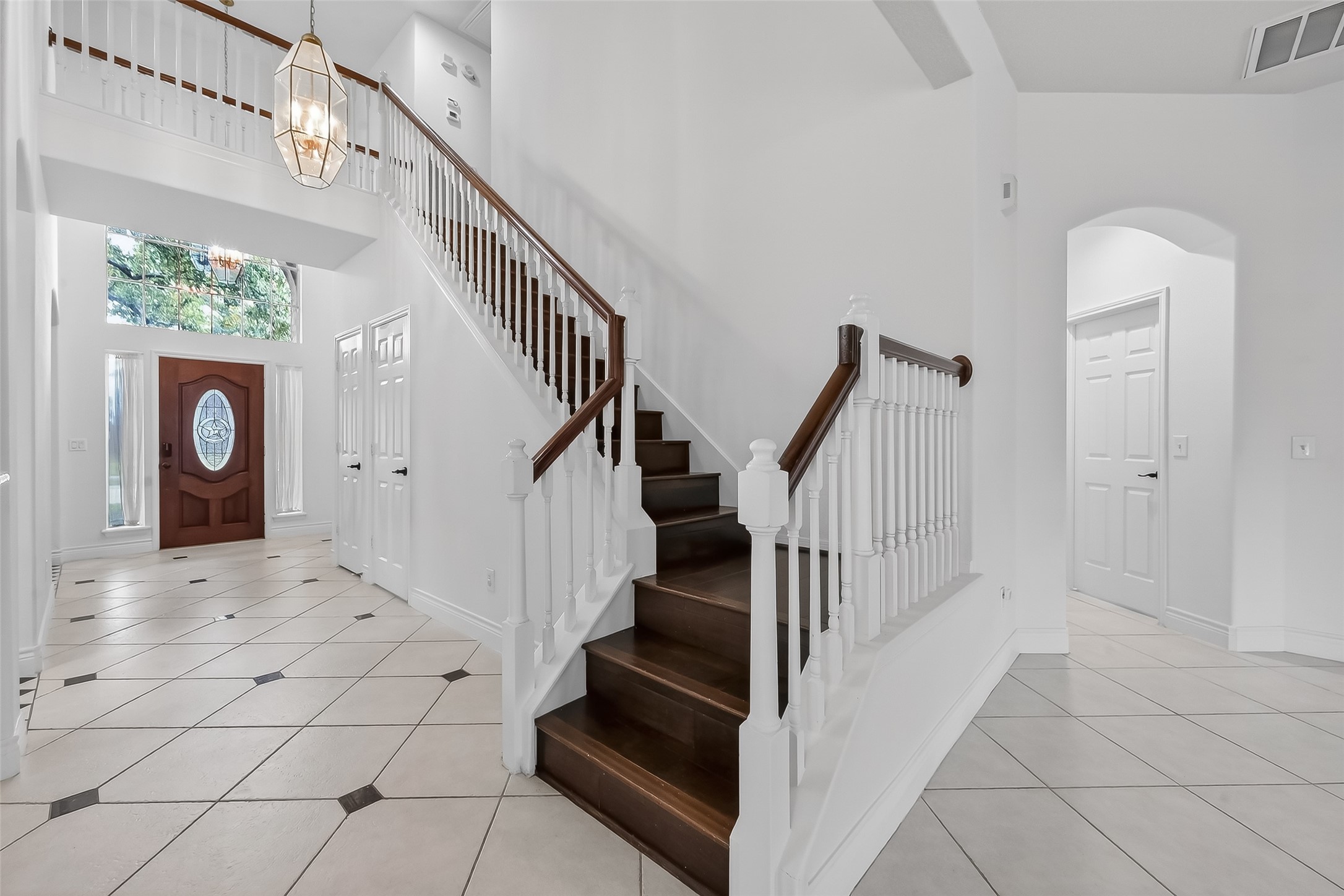 19715 Azalea Brook Way Houston, TX 77084 - Photo 8 of 48 a view of entryway and hall with a front door