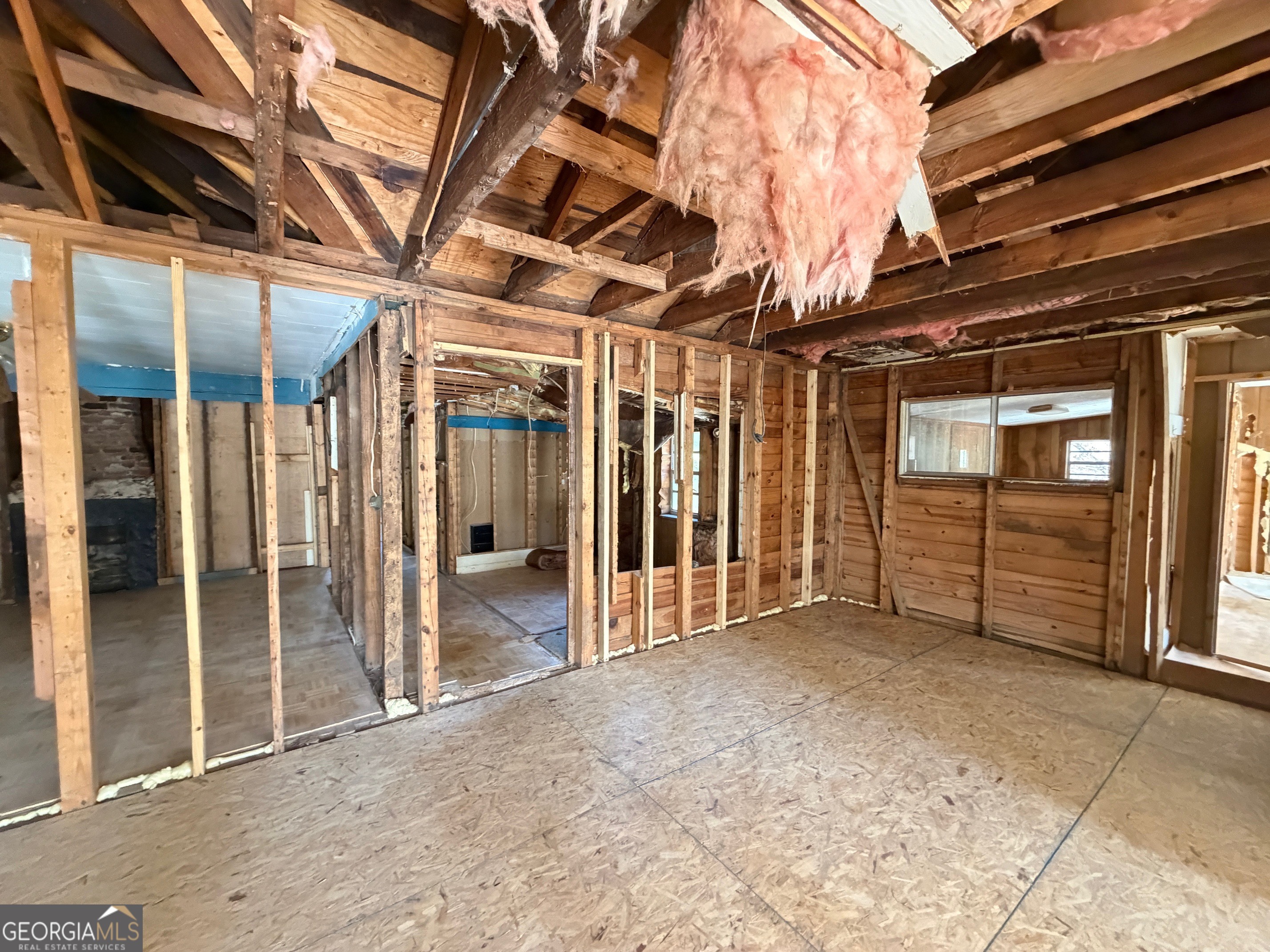 124 Bradshaw Road Thomaston, GA 30286 - Photo 8 of 10 a view of an empty room with wooden roof