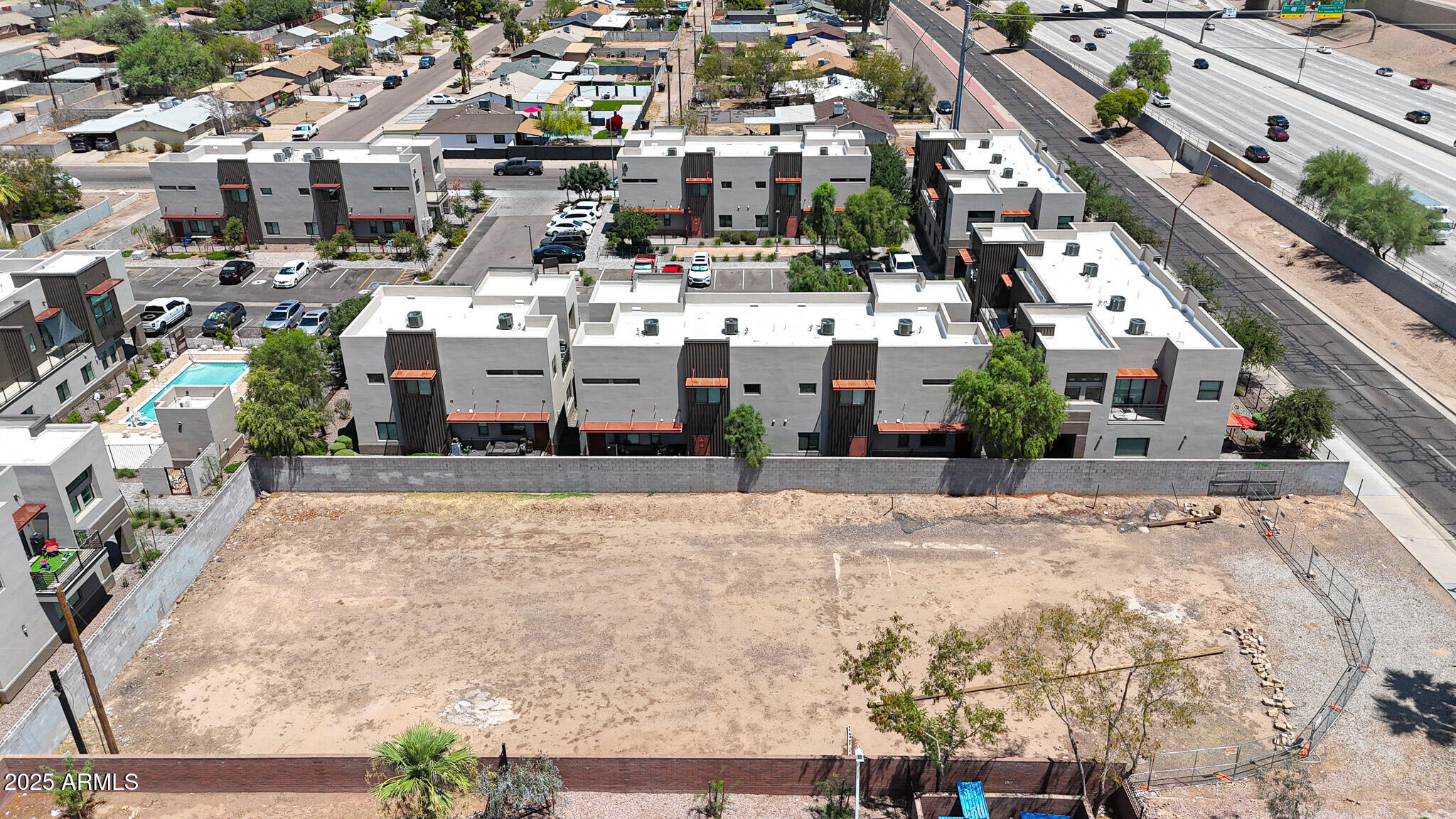 1272 South Price Road, Unit 80 Tempe, AZ 85281 - Photo 6 of 30 a view of multiple houses with a street