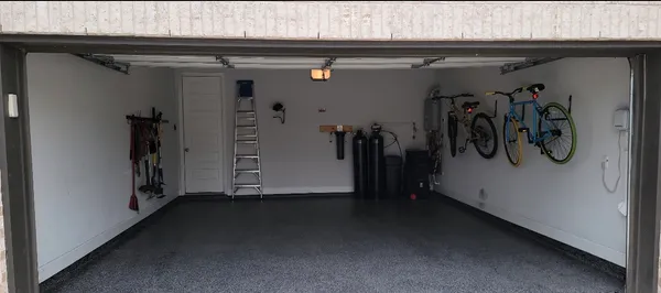 a view of walk in closet with clothes