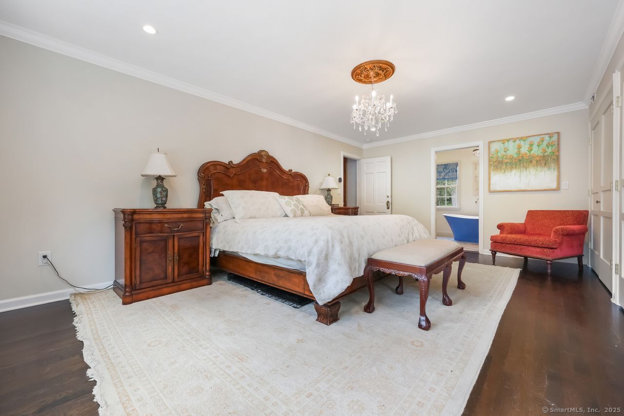 176 Logan Road New Canaan, CT 06840 - Photo 26 of 40 a bedroom with a bed and dresser