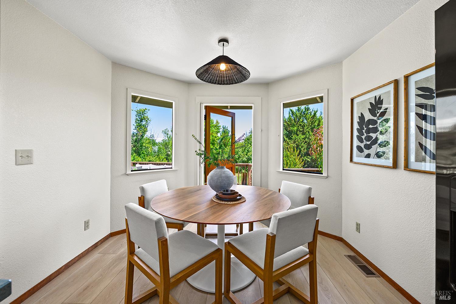 7595 Giusti Road Forestville, CA 95436 - Photo 12 of 41 a dining room with furniture window and outside view