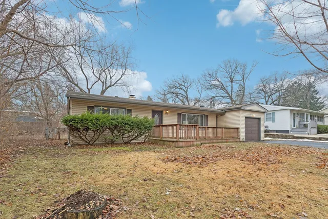 front view of a house with a yard
