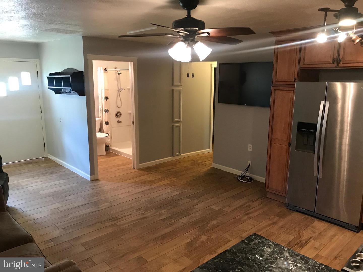 11 1st Street Indian Head, MD 20640 - Photo 2 of 8 a view of empty room with wooden floor