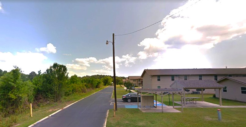 522 Oak Street Zwolle, LA 71486 - Photo 6 of 7 a view of a lake with a patio