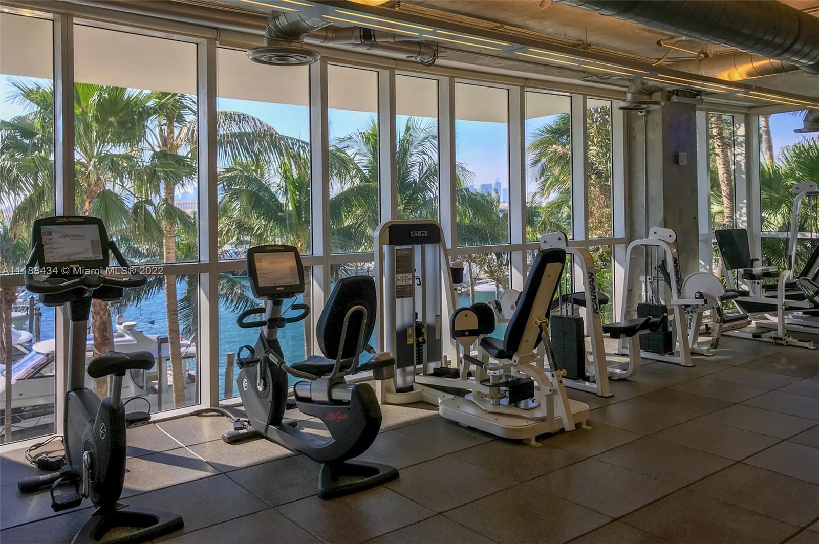 400 Alton Road, Unit TH4A Miami Beach, FL 33139 - Photo 33 of 38 a view of a room with gym equipment