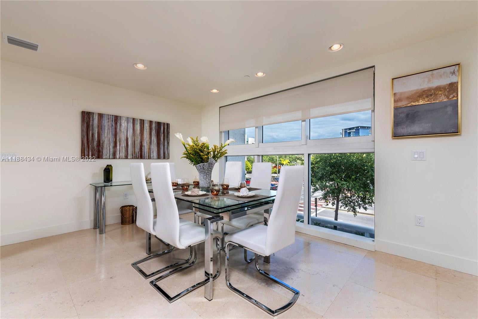 400 Alton Road, Unit TH4A Miami Beach, FL 33139 - Photo 7 of 38 a work room with furniture and a potted plant