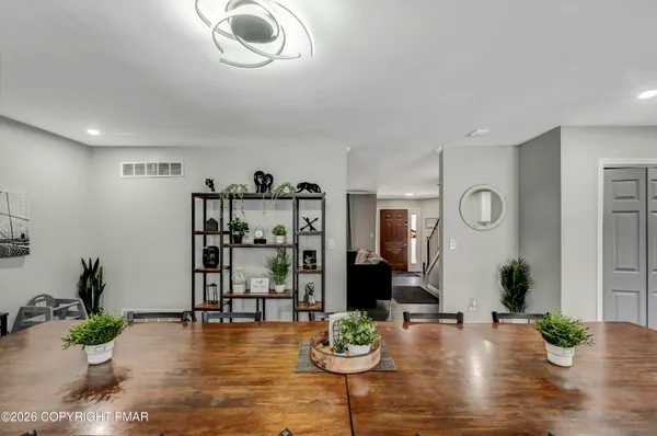 a view of a dining room with furniture