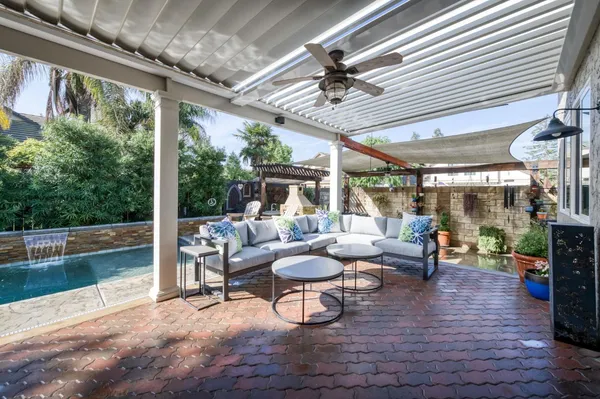 a outdoor living space with furniture and garden view