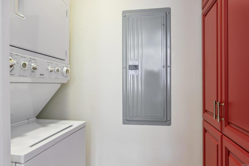 848 Prospect Street, Unit E La Jolla, CA 92037 - Photo 13 of 16 a utility room with dryer and washer